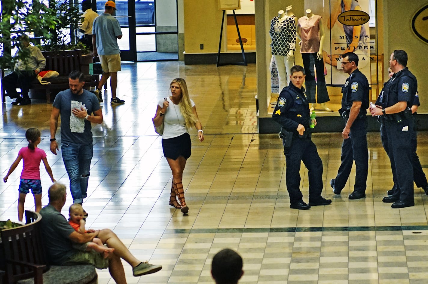 Police presence was strong in the shopping center in spite of rumors that the protest had been cancelled.]At the Roseville Center Mall, police was on high alert in spite of rumors that the protest had been cancelled.Richard Tsong-taatarii@startribune.com