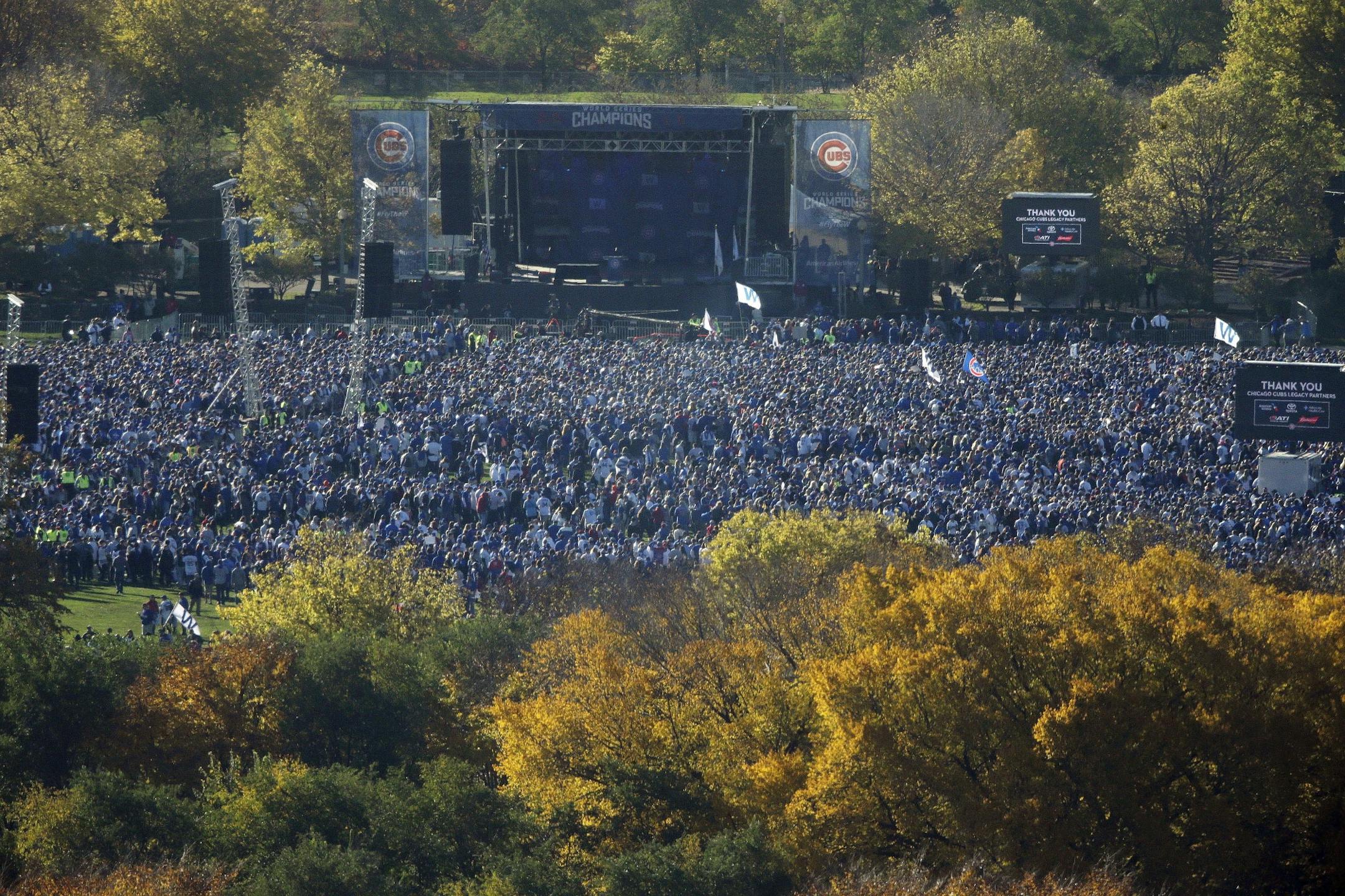 Fans gather at Grant Park for a rally honoring the World Series champion Chicago Cubs baseball team, Friday, Nov. 4, 2016, in Chicago.