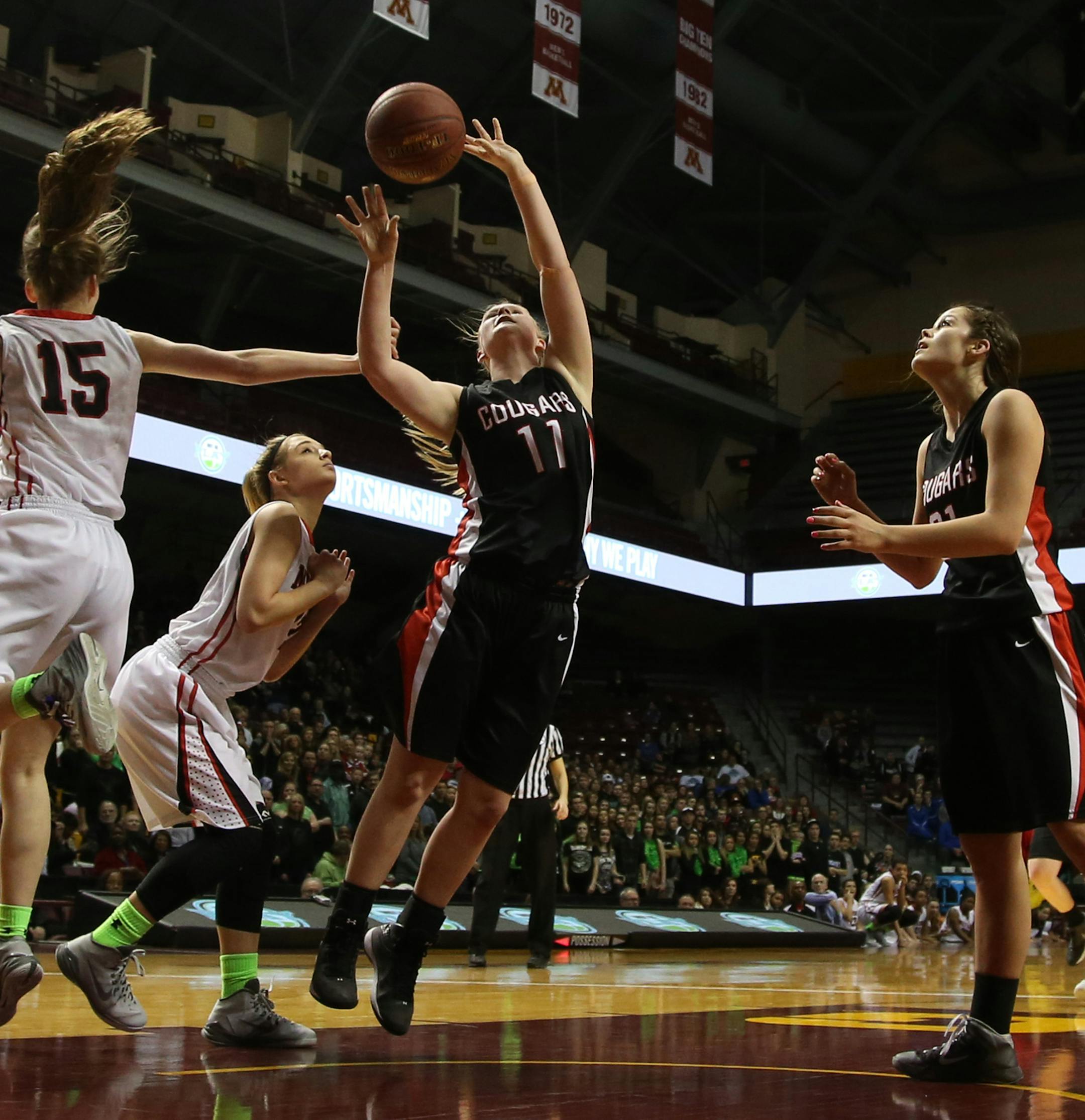 Ada-Borup's Elizabeth Birkemeyer got fouled by Maranatha Christian Academy's Sami Payne during the second half. ] (KYNDELL HARKNESS/STAR TRIBUNE) kyndell.harkness@startribune.com Class1A girls' basketball finals Ada-Borup vs Maranatha Christian Academy at Williams Arena in Minneapolis Min., Saturday, March 21, 2015. Ada-Borup won over Maranatha Christian Academy 82-65