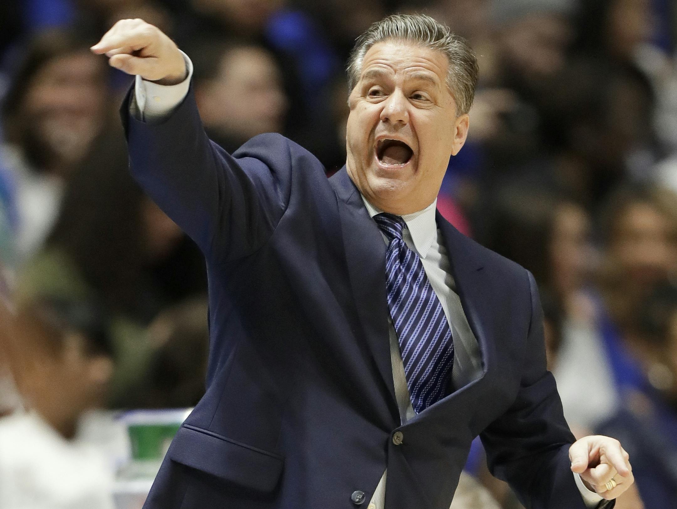 Kentucky head coach John Calipari directs his players in the first half of an NCAA college basketball game against Alabama in the semifinals of the Southeastern Conference tournament Saturday, March 11, 2017, in Nashville, Tenn. (AP Photo/Wade Payne)