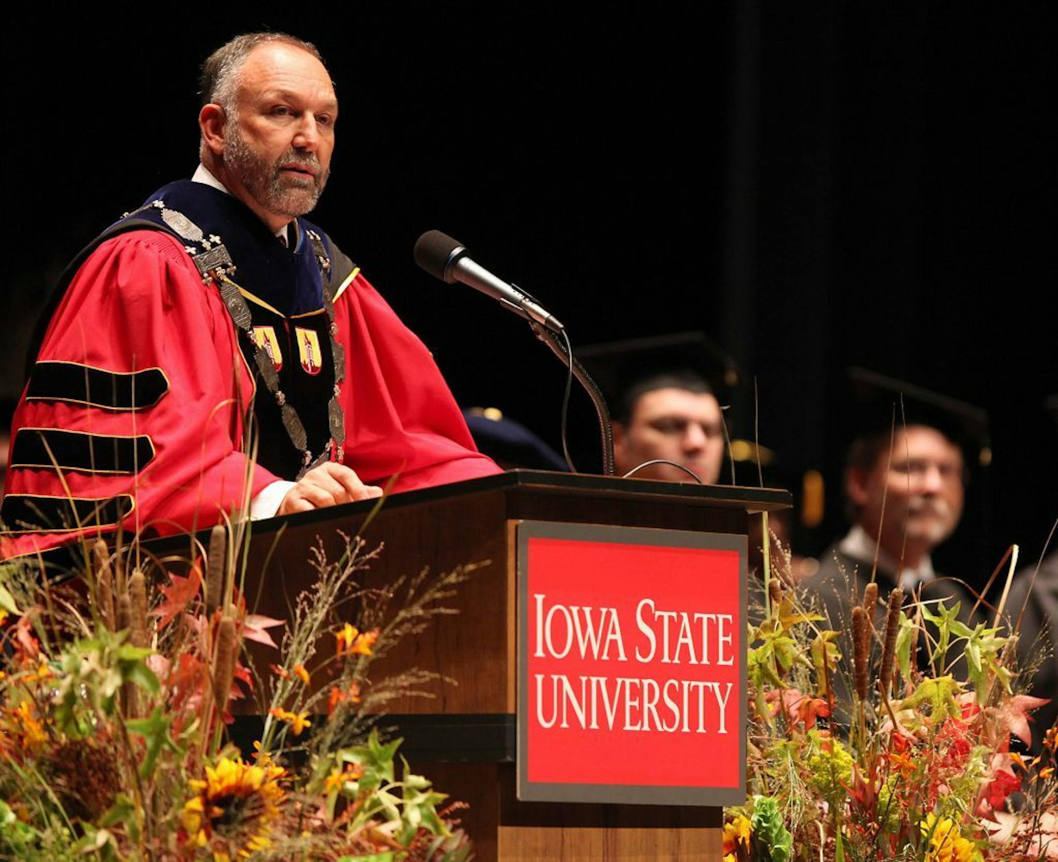 FILE - In this Sept. 14, 2012 file photo, Iowa State President Steven Leath speaks he is officially installed as the university's 15th president during a ceremony in Ames, Iowa. Leath caused "substantial damage" to a university airplane he was piloting when it made a hard landing at an Illinois airport last year - a costly incident kept quiet for 14 months. Reports obtained by The Associated Press show both wings suffered damage after Leath failed to navigate windy conditions and hit the runway