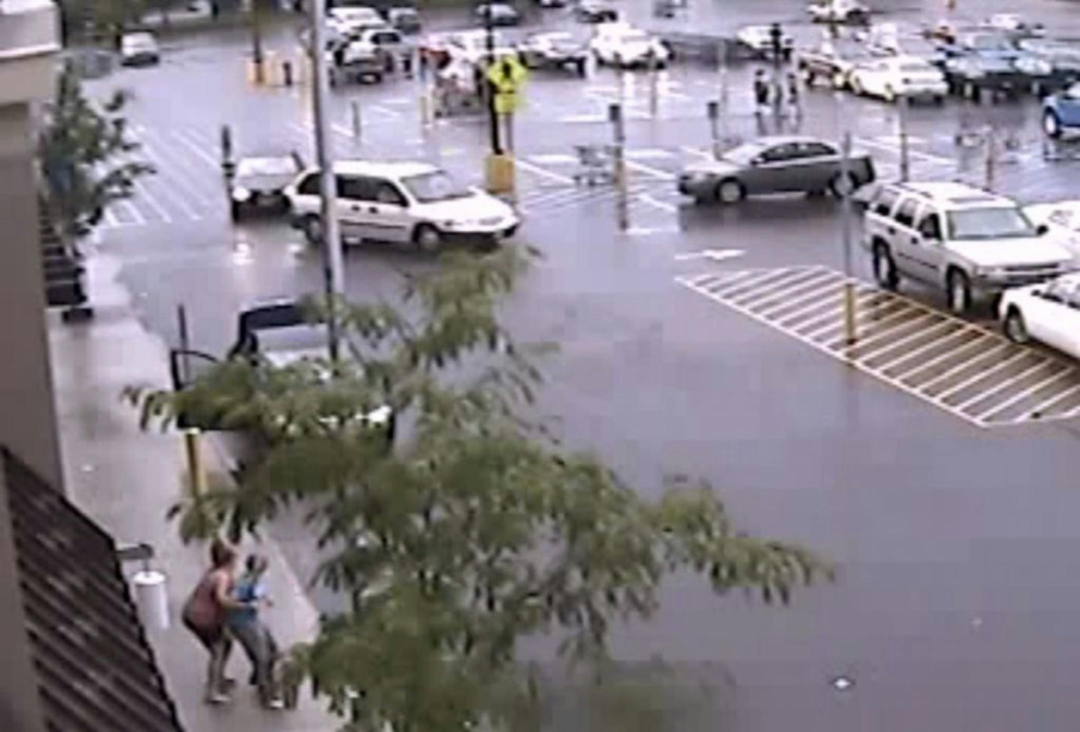 A Wal-Mart store surveillance camera caught what appears to be a kidnapping in Forest Lake.