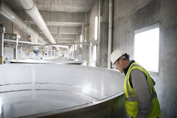 CEO William Rahr looked into the steeper at the new $68 million malthouse at Rahr Malting Co., a family-owned production facility in Shakopee, on Tues