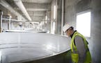 CEO William Rahr looked into the steeper at the new $68 million malthouse at Rahr Malting Co., a family-owned production facility in Shakopee, on Tues