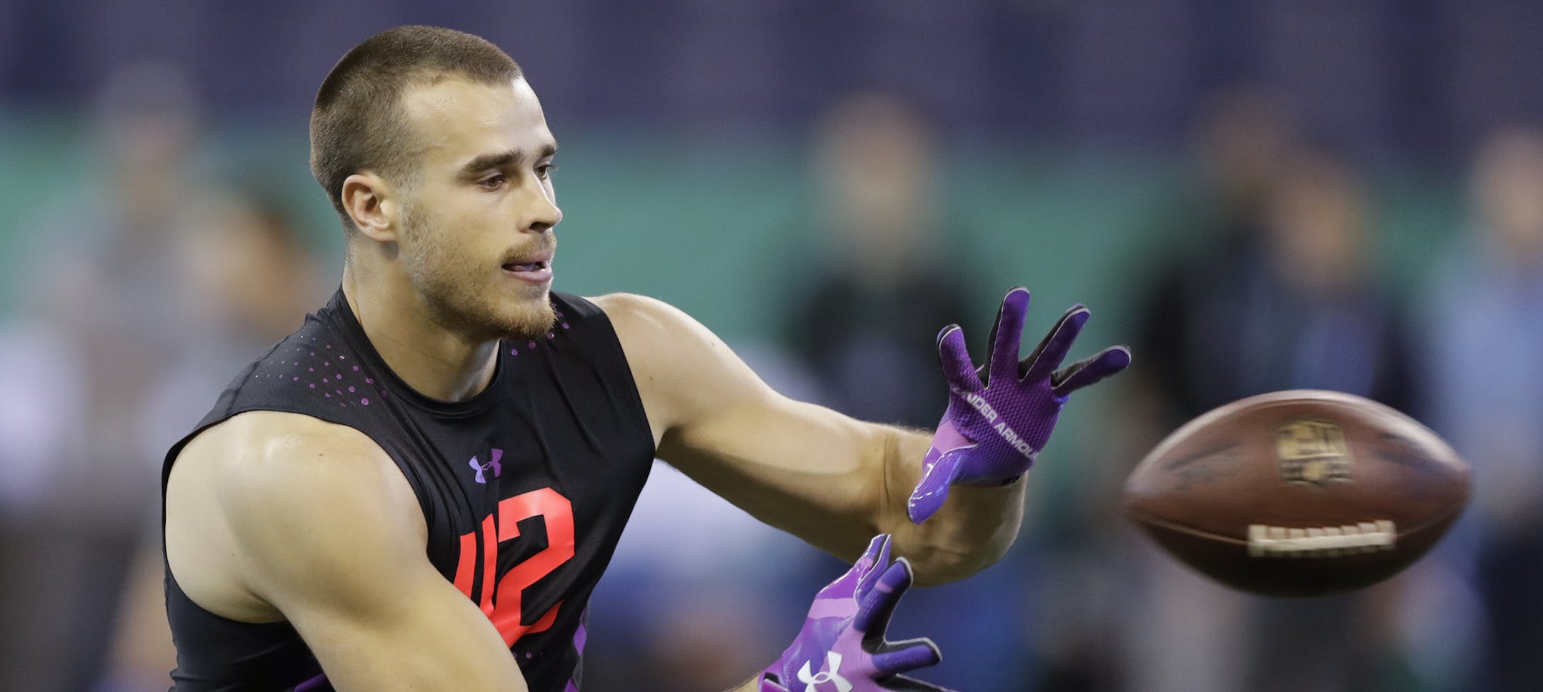 South Dakota State wide receiver Jake Wieneke runs a drill during the NFL football scouting combine, Saturday, March 3, 2018, in Indianapolis. (AP Photo/Darron Cummings) ORG XMIT: INDC1