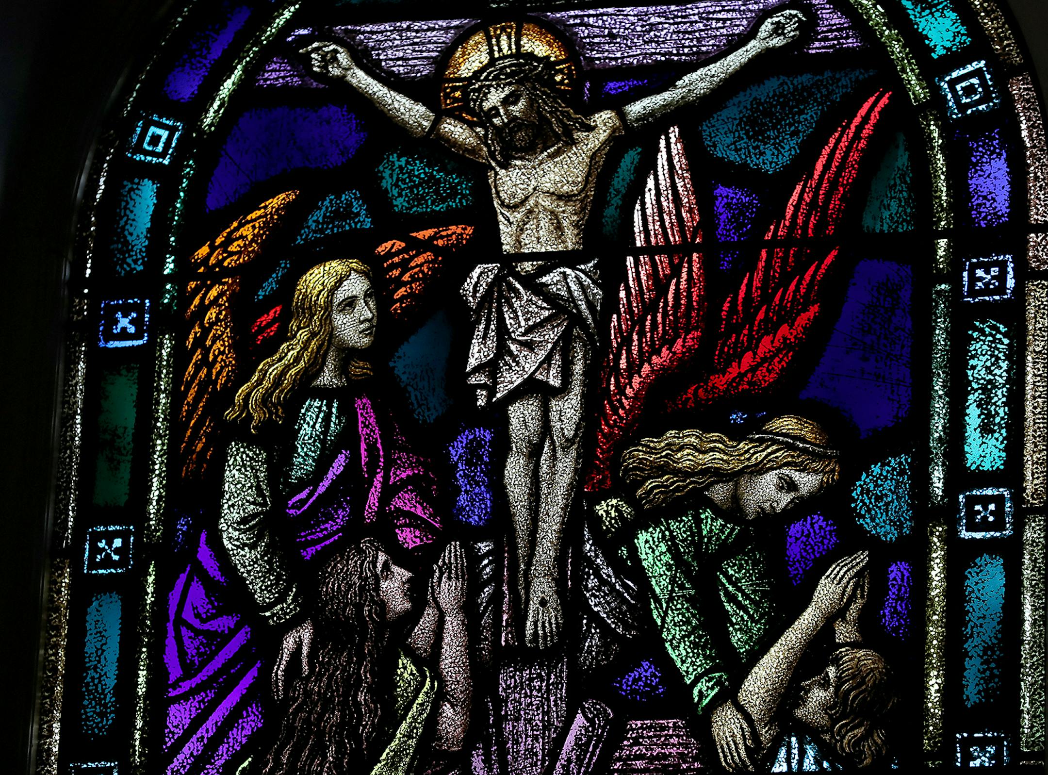 A stained glass window is seen in the St. Clare's Monastery Chapel Thursday, April 16, 2020, in Sauk Rapids, MN. Poor Clare nuns of St. Clare's Monastery nuns met with journalists in the monastery's parlor, the one room where outsiders have partial access to the nuns in a room divided by a metal lattice with a folding wooden divider.