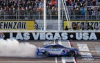 Kyle Larson (5) celebrates after winning a NASCAR Cup Series auto race at Las Vegas Motor Speedway on Sunday.