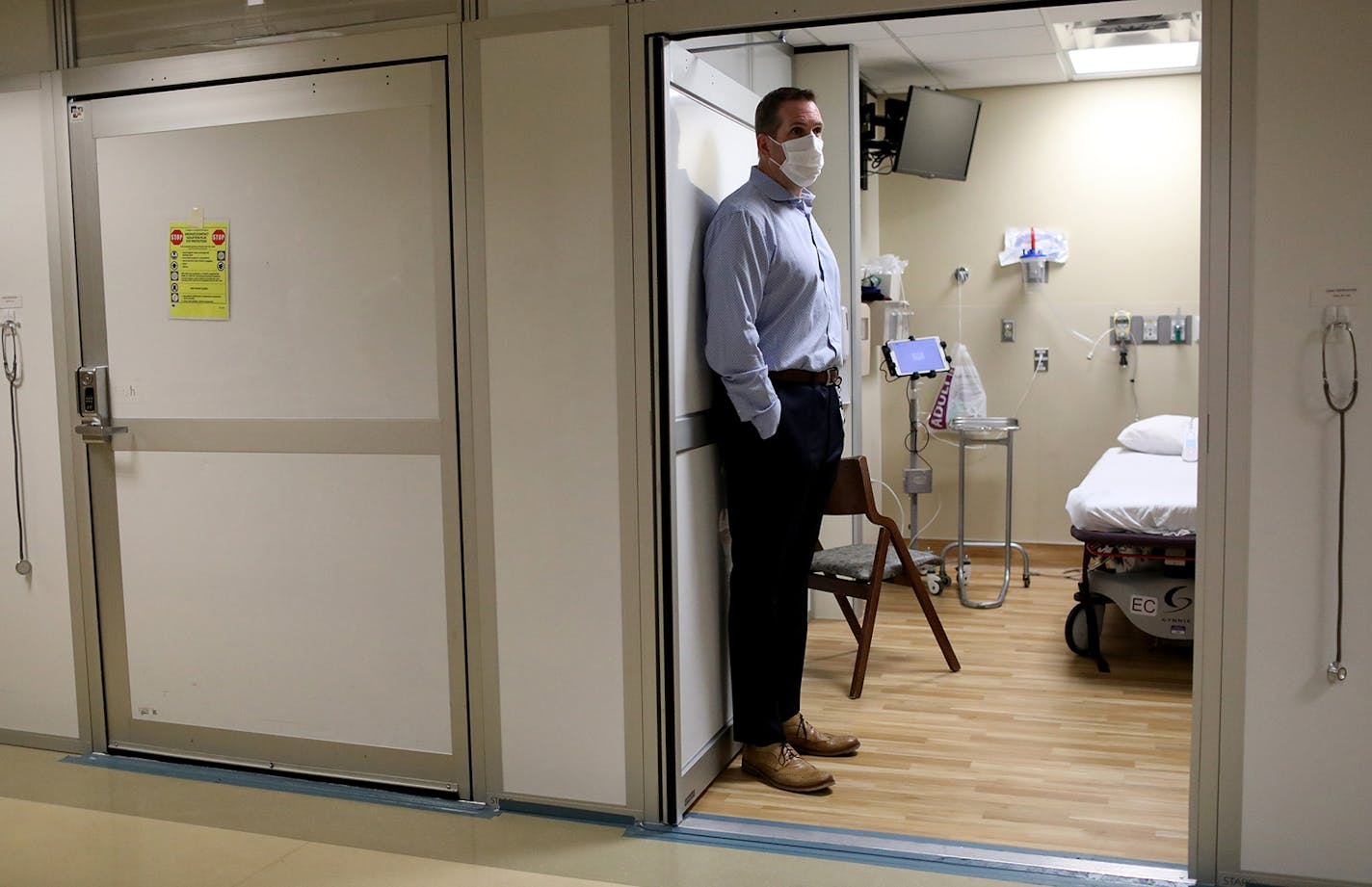 Brent Walters, MD, critical care and emergency medicine physician, in a patient room during a Park Nicollet Methodist Hospital COVID-19 Emergency Room tour Thursday, June 4, 2020, in St. Louis Park, MN.