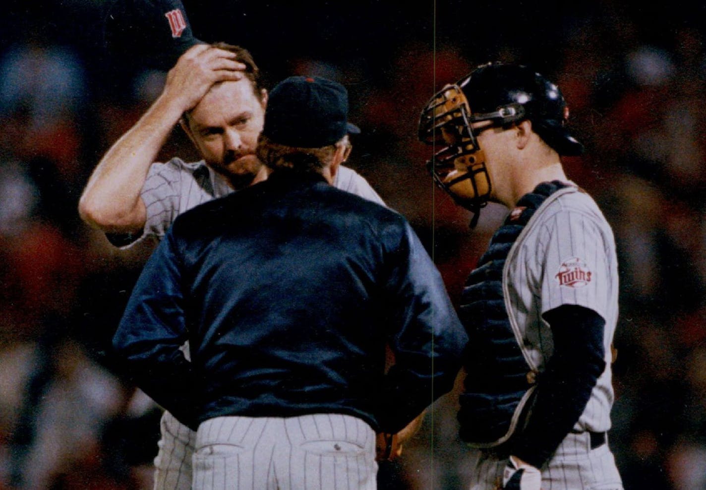 October 22, 1987 L to R: Conference at the mound during game 5. Bert Blyleven (with hat off ), manager Tom Kelly (with back towards camera) , and cathcer Tim Laudner. Bruce Bisping, Minneapolis Star Tribune