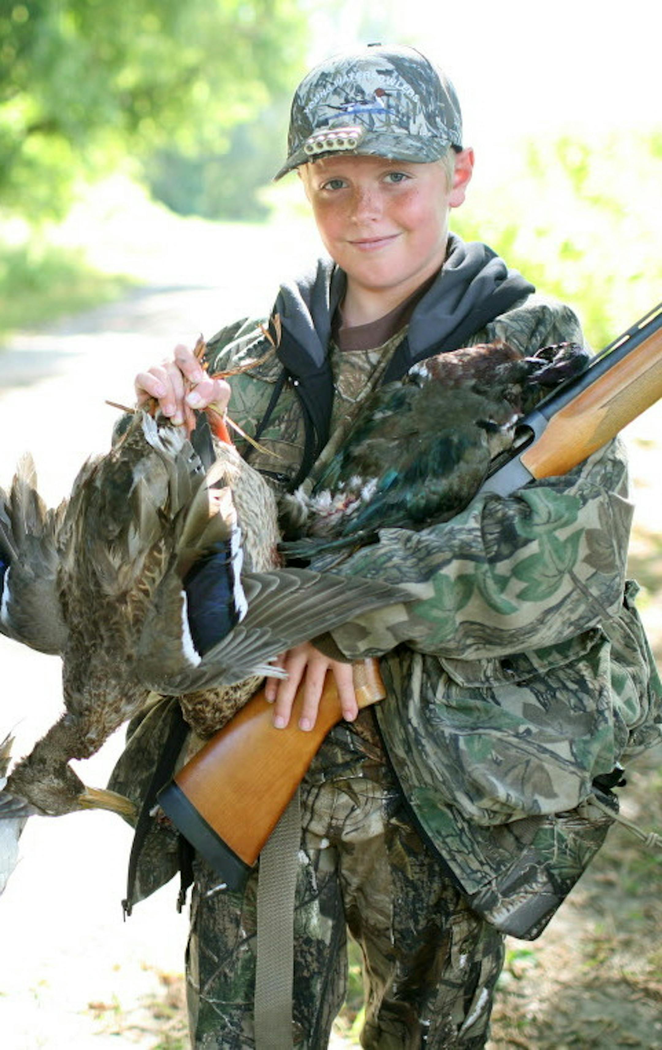 Trevor Lenzen, 13, left, and Nelson Brothers, 11, with the ducks from the mornings youth hunt. Both hunters had successful mornings, taking a total of seven ducks between them, a first time for both. ] It was the youth Waterfowl Opener Saturday, and the Minnesota Waterfowl Association selected 18 kids and a parent for a morning's duck hunting in/near the Minnesota Valley Wildlife Refuge in the south metro. Hunters gathered at 5:15 a.m. to head out to the various hunting locations. USFWS Wildlife