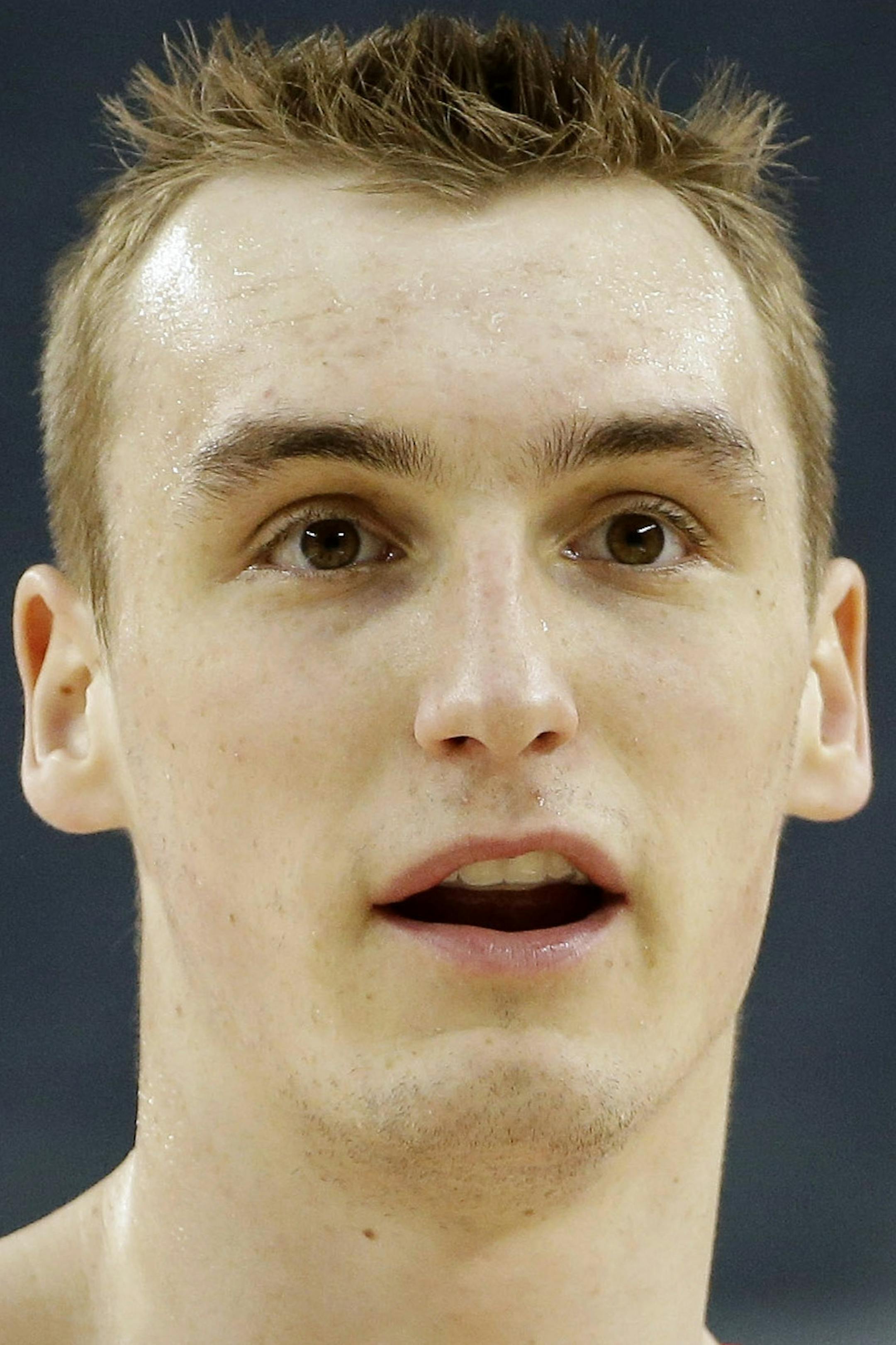 Wisconsin forward Sam Dekker participates in a drill during practice for an NCAA Final Four tournament college basketball semifinal game Friday, April 4, 2014, in Dallas. Wisconsin plays Kentucky on Saturday, April 5, 2014. (AP Photo/David J. Phillip)
