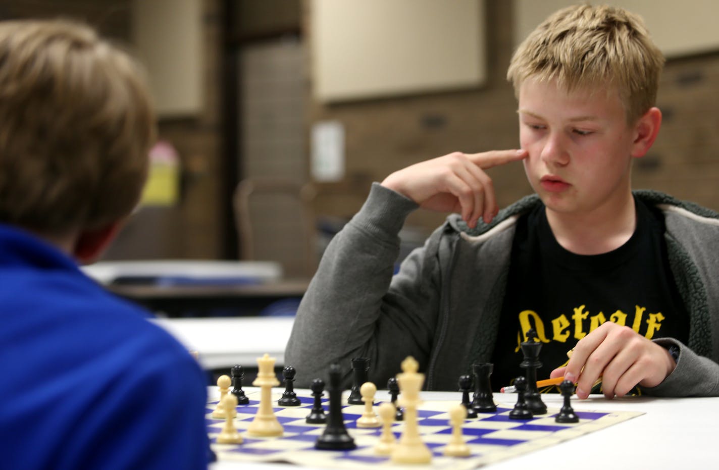 Seventh grader Zander Burton is the number one player on the chess team that will play in the National Championship Tournament in Atlanta. ] JOELKOYAMA&#x201a;&#xc4;&#xa2;jkoyama@startribune Burnsville, MN on April 8, 2014. The Burnsville chess program has existed for decades and become an integral part of the district's identity. The junior high chess team in particular does very well and recently won the state title again. Chess is integrated across the district, with kids learning to play in