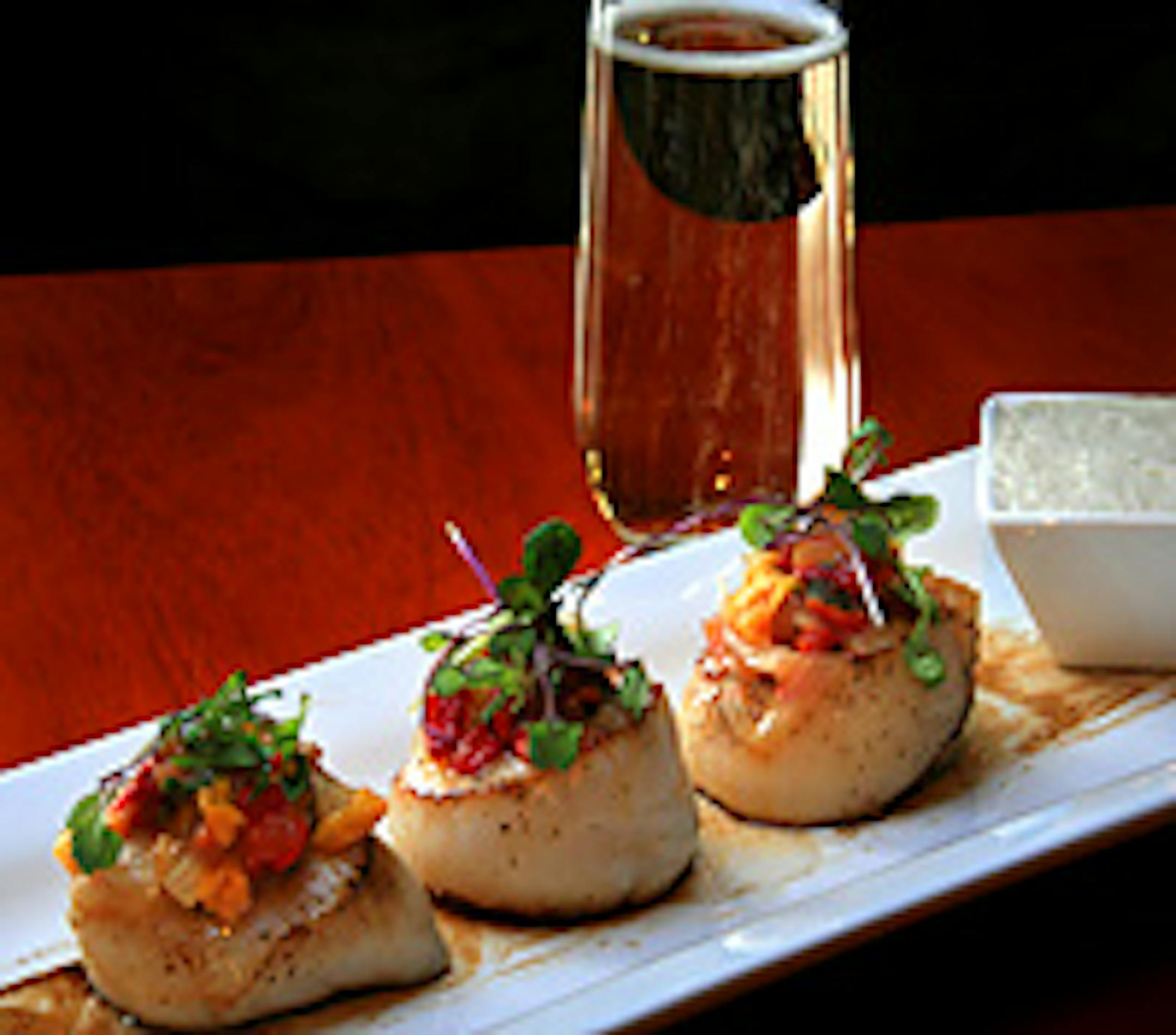 Chef Patrick Antanalian brings color into the the menu with his scallops with smoked ratatouille, sunchoke silk foam and balsamic paint at Sanctuary.