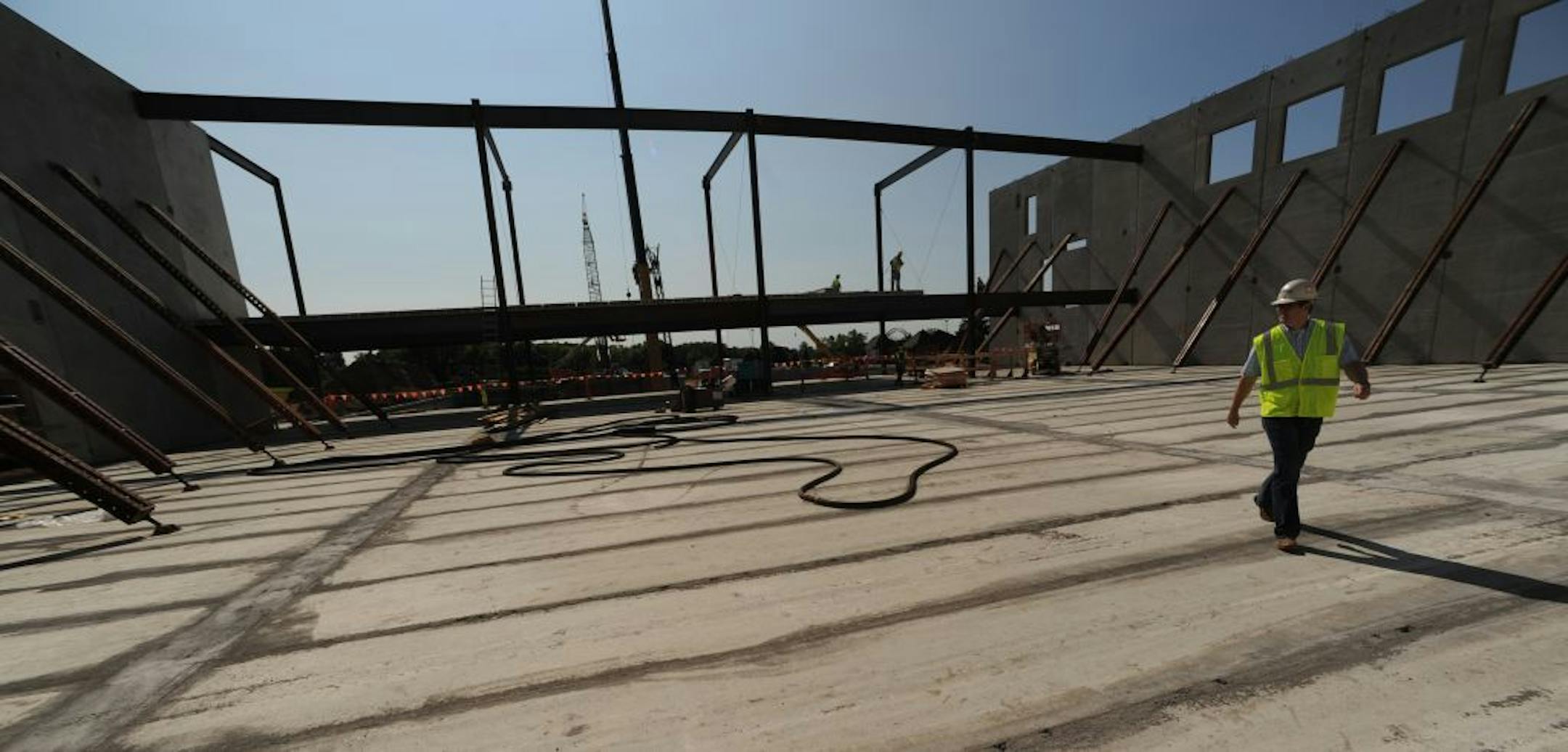 Work continues with crews raising the walls and floors of the new building. At a time when most schools are cutting back, St. Thomas Academy is adding on an addition almost 2/3 the size of the existing building. Trouble is it needs more money to complete the work. It has $13.5 million and needs $18 million to finish it all but the four new gyms will open next year as planned with or without additional contributions.