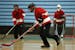 North Suburban's Josh Hamann (6), shown moving the puck down the court, scored five goals in the adapted floor hockey championship game in the cogniti