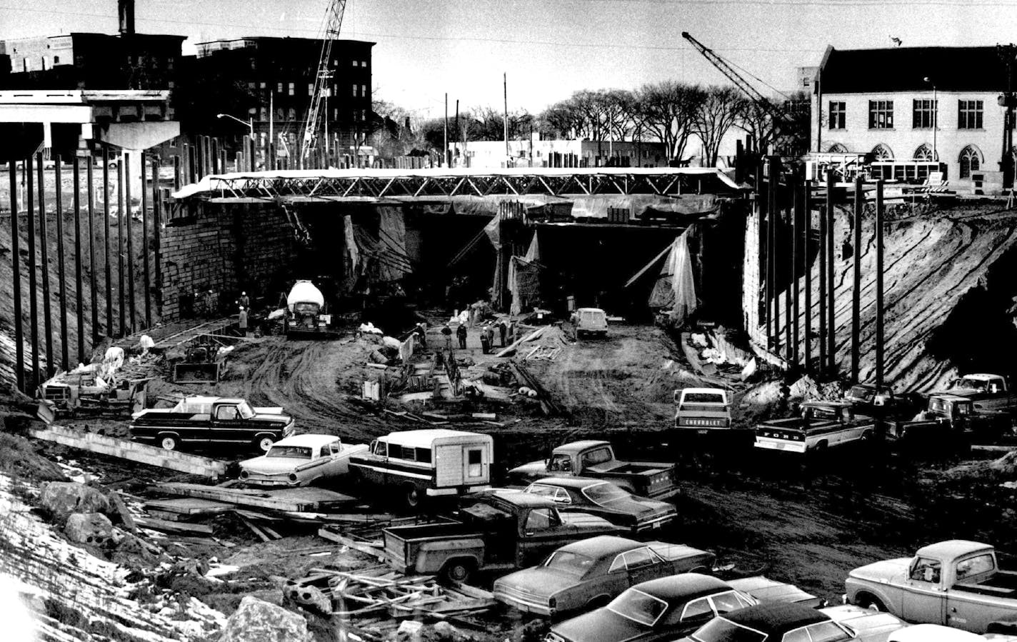 December 4, 1969 Freeway Tunnel Construction of the 1,400 foot Interstate Hwy. 94 tunnel under the Hennepin-Lyndale Avs. bottleneck has entered its third and final year. Completion of this $7.36-million segment is due in November 1970, when the freeway will be extended from the bottleneck north to Olson Hwy. This view looks north from the current terminus of the westbound freeway, with Hennepin Av. Methodist Church shown at right. December 2, 1969 Powell Krueger, Minneapolis Star Tribune ORG XMIT: MIN2017012713070323