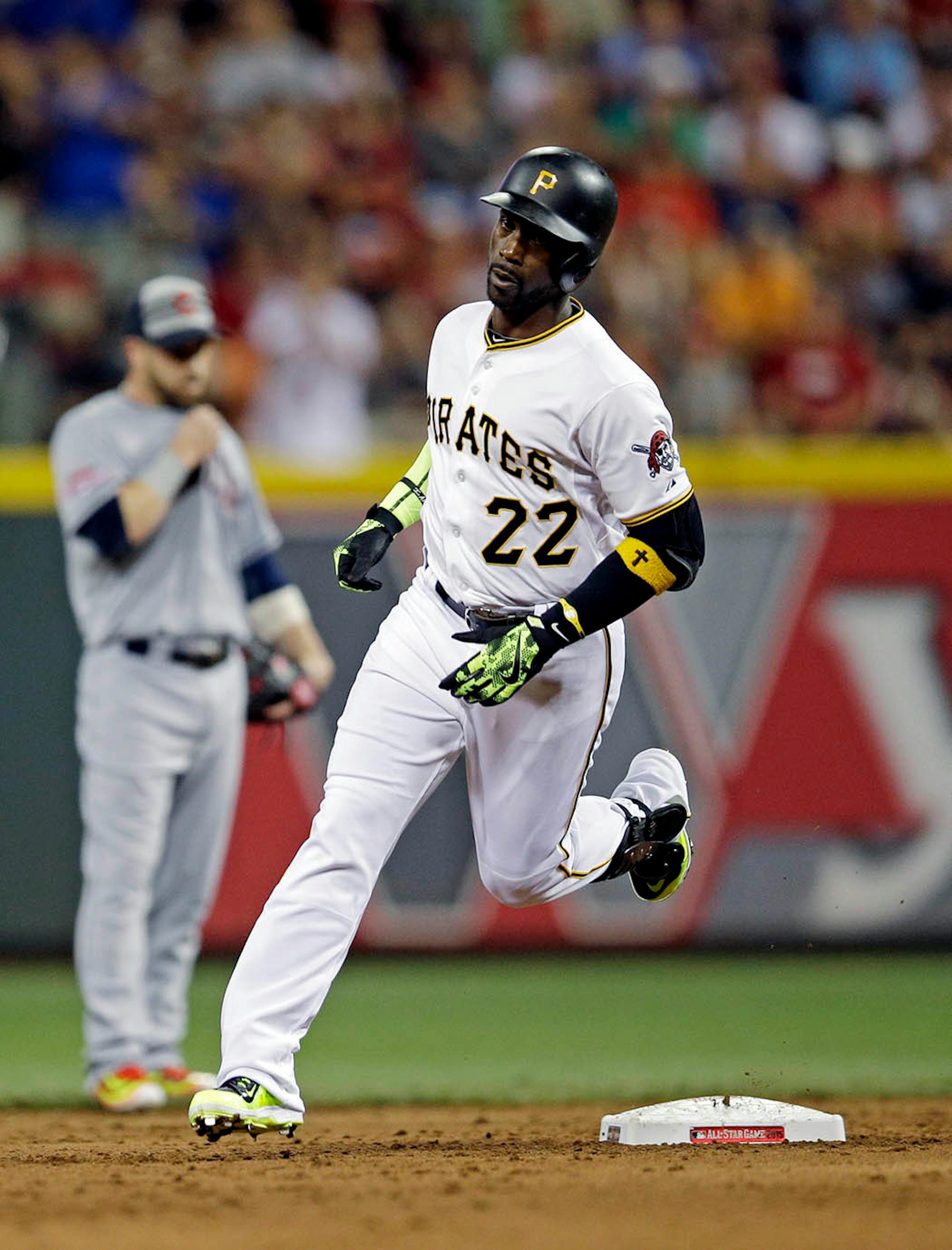 National League's Andrew McCutchen, of the Pittsburgh Pirates, runs after hitting a home run during the sixth inning of the MLB All-Star baseball game, Tuesday, July 14, 2015, in Cincinnati.