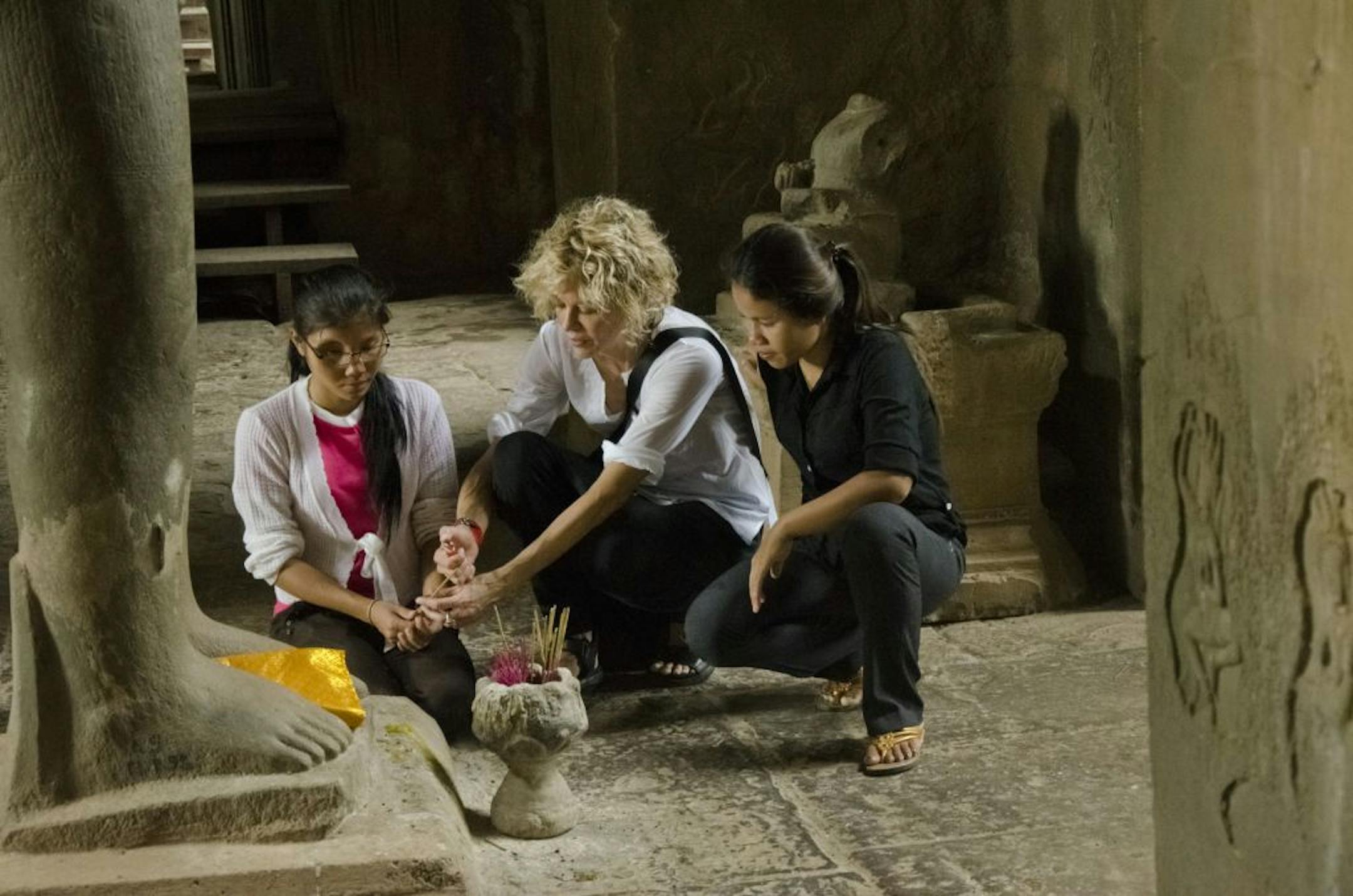 Meg Ryan, center, with Somana Long and Srey Pov at Angkor Wat, shines a spotlight on human trafficking in Cambodia in "Half the Sky."