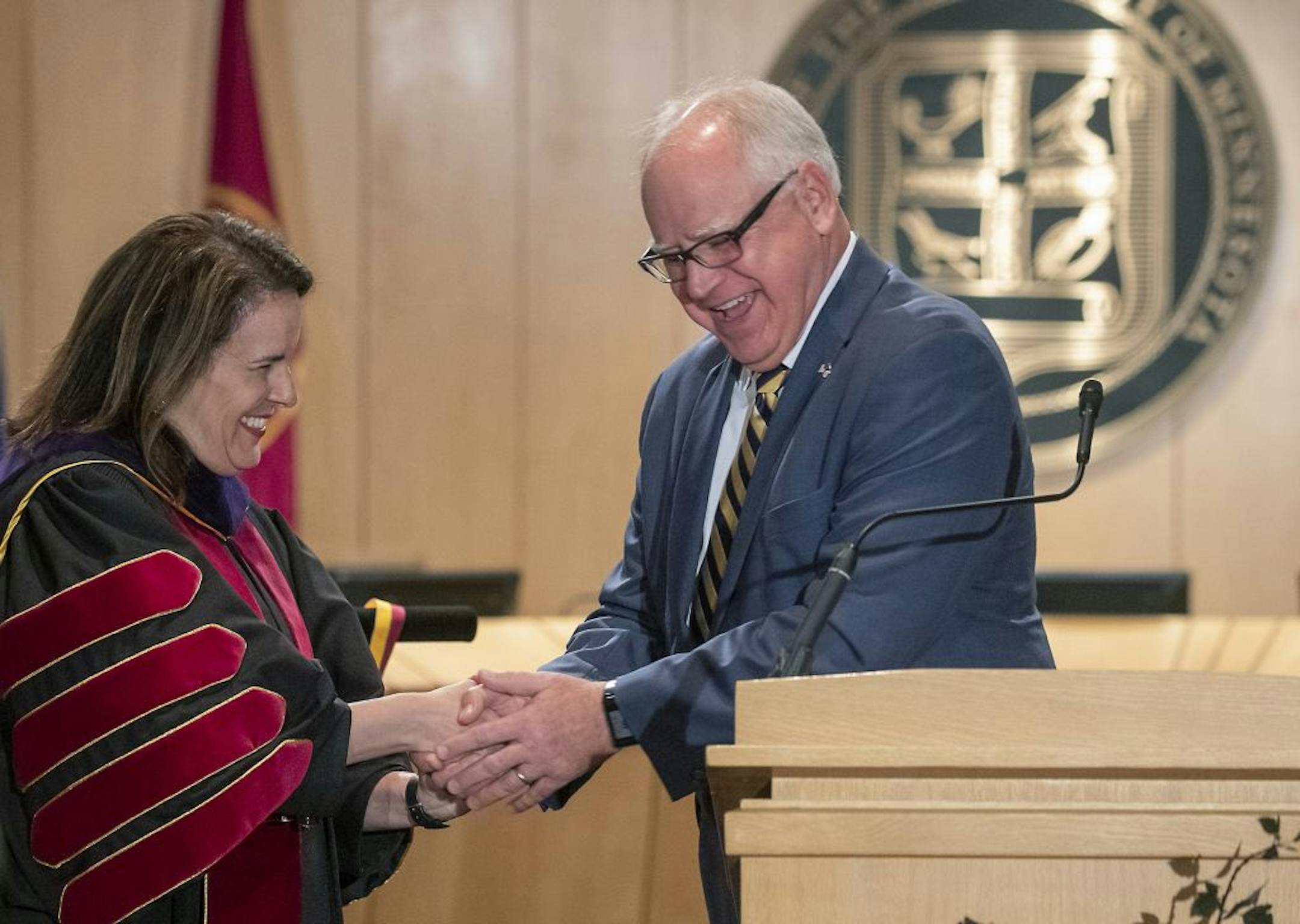 Minnesota Governor Tim Walz handed the mace over to Joan Gabel during an official inauguration ceremony as the University of Minnesota's first female president at McNamara Alumni Center, Friday, September 20, 2019.