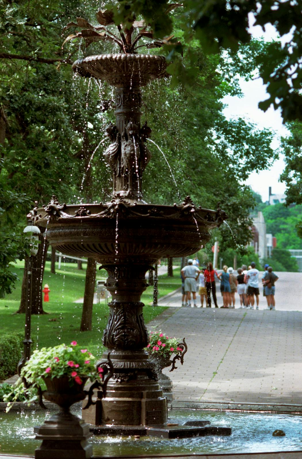 The Irvine Park fountain, a 1978 reproduction of the 1881 original, features water spouting from gargoyles rather than dog heads.