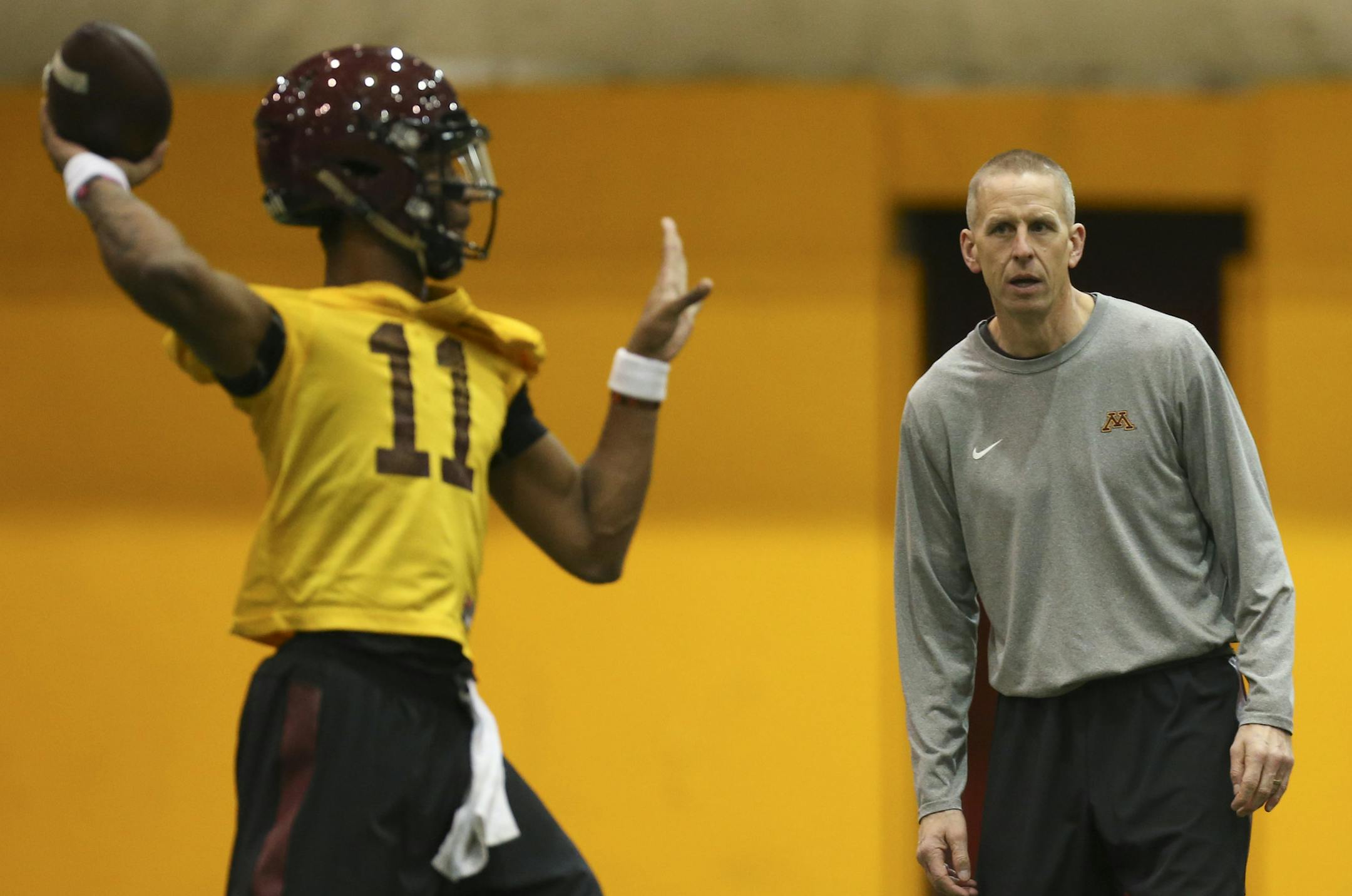 New offensive coordinator Jay Johnson watched sophomore quarterback Demry Croft throw during a drill Tuesday afternoon. ] JEFF WHEELER ï jeff.wheeler@startribune.com The University of Minnesota held their first spring football practice Tuesday afternoon, March 1, 2016 at the Gibson-Nagurski Football Complex. ORG XMIT: MIN1603011716113069