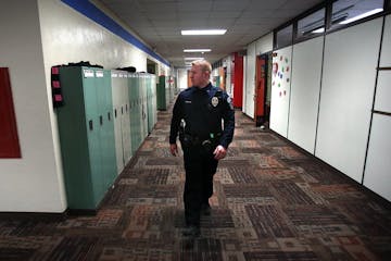 Jordan police officer Shane Schultz visited Jordan Elementary school in 2013 before the "Cops In Schools" program was started.