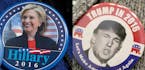 AP Photo/Mary Altaffer/Andrew Spear/The New York Times Hillary Clinton button and Donald Trump. (AP Photo/Mary Altaffer) ORG XMIT: MIN2016040813524411