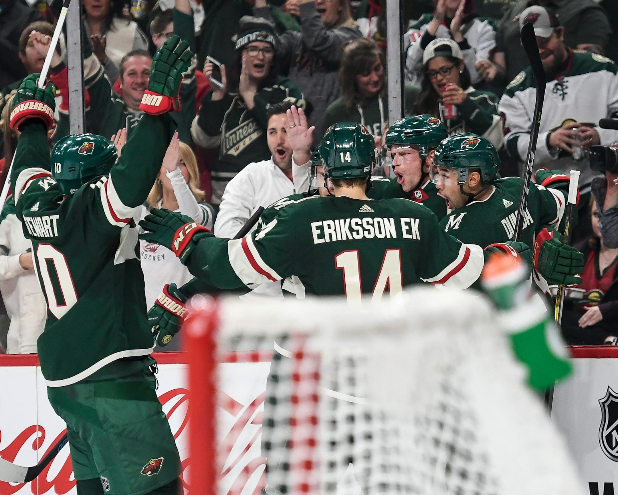 Teammates celebrated with Minnesota Wild center Eric Staal (12) after he scored a goal on the Columbus Blue Jackets in the first period.