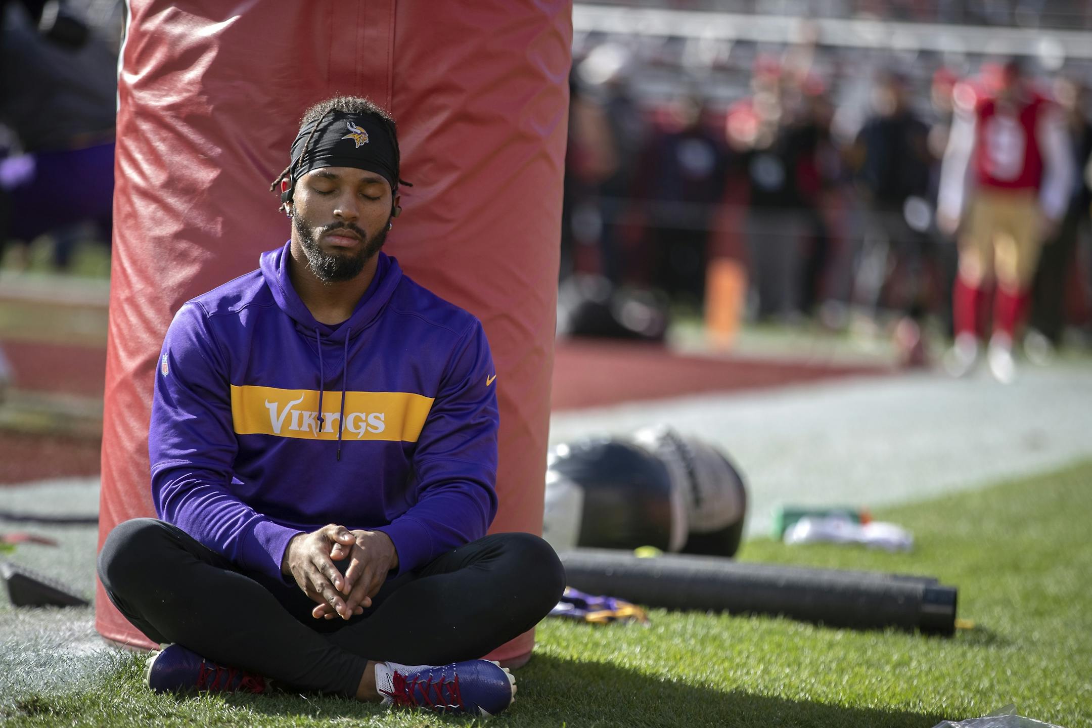 Minnesota Vikings running back Ameer Abdullah meditated on the field before suiting up.