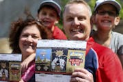 Blake Fry and his wife Michele, hold their coveted All-Star Game tickets before heading to watch the Twins take on the New York Yankees with their chi