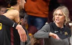 Gophers quality control coach Kelsey Steinhagen gave instructions during Monday’s game against Illinois at Williams arena.