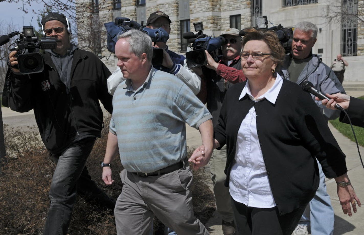 May 4, 2011: William Melchert-Dinkel leaves Rice County Courthouse In Fairbault, Minn., with his wife Joyce Melchert-Dinkel.