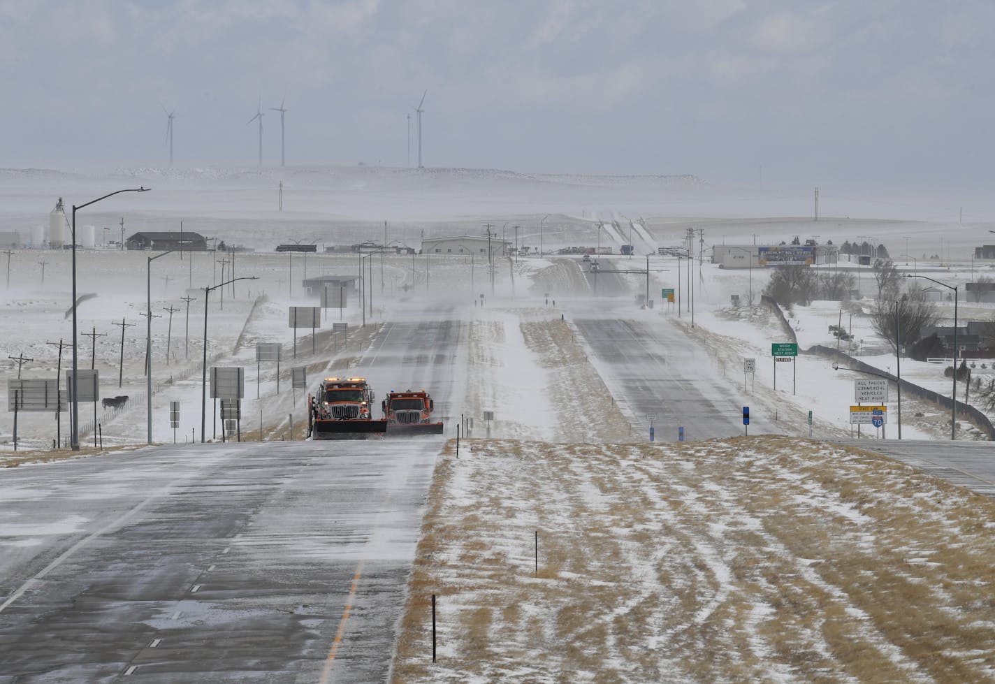 A sudden drop in barometric pressure unleashed a rare "Bomb Cyclone" over Colorado on Wednesday, crippling the region with heavy snows and high winds. (RJ Sangosti/The Denver Post via AP)