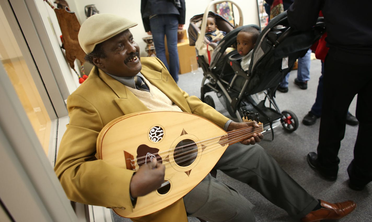 Abdulkadir Said, played traditonal Somali music as visitors walked in during the grand opening of the Somali Artifact and Cultural Museum in Minneapolis Min., Saturday, October 19, 2013 ] (KYNDELL HARKNESS/STAR TRIBUNE) kyndell.harkness@startribune.com