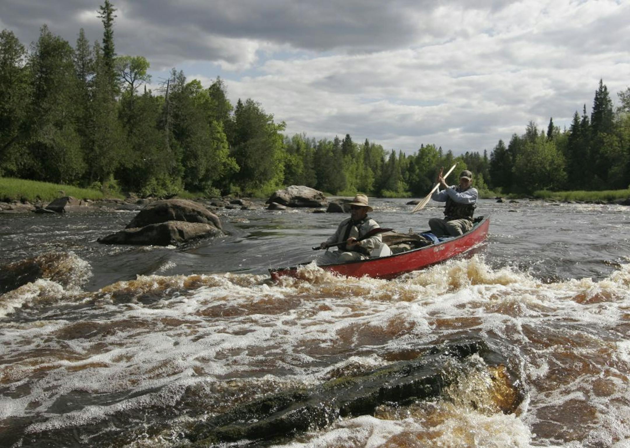 Tom Kalahar and Marv Boerboom head into Deadman's Rapids on the Little Fork River. Despite the ominous name, the pair successfully navigated the whitewater.