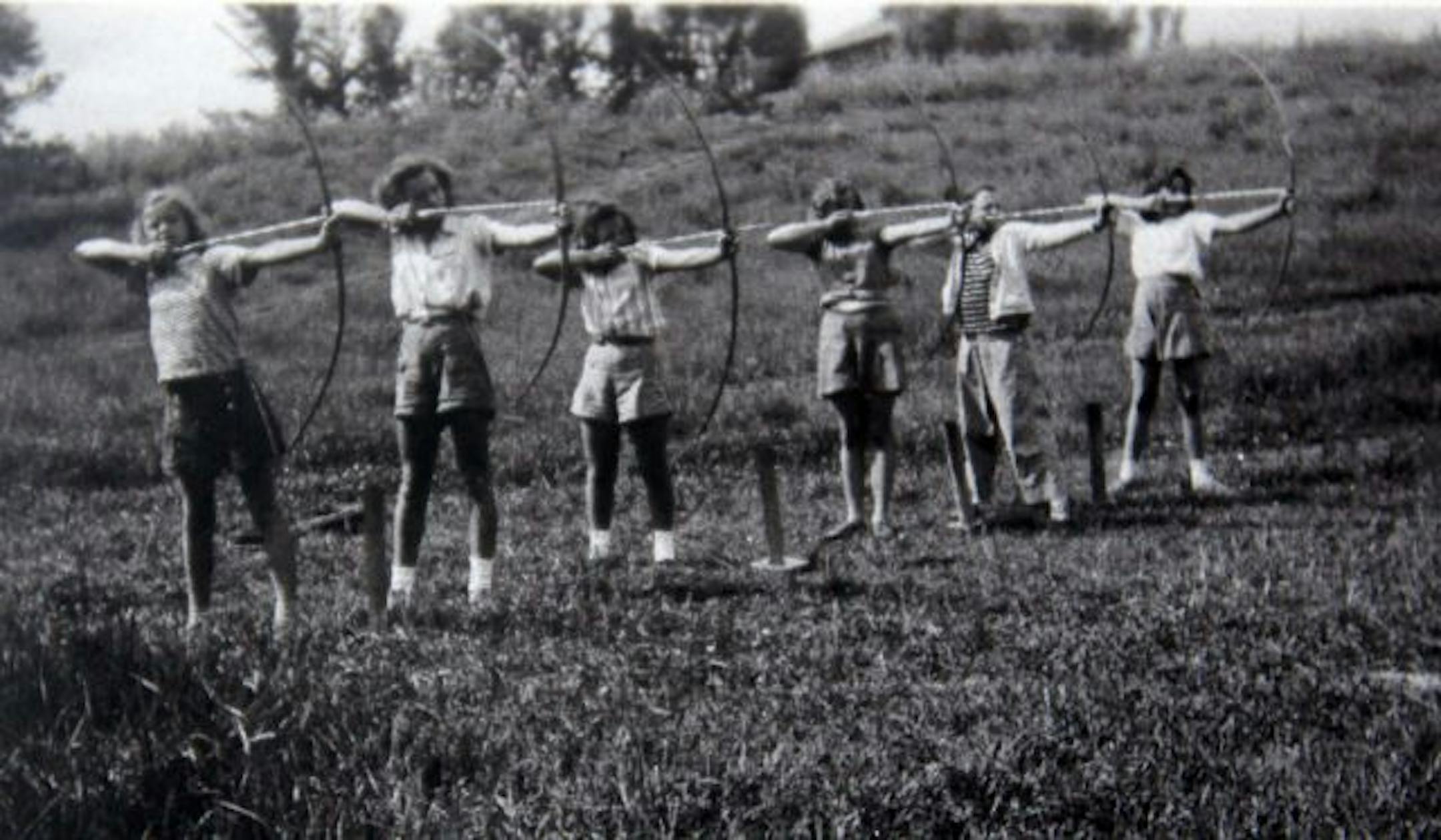 Archery was a common activity at Greenwood Camp. Here, girls take aim in the 1940s.
