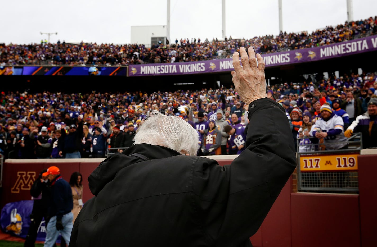 Star Tribune sports columnist Sid Hartman waved to the crowd after blowing the Gjallarhorn before the Vikings vs. Bears game at TCF Bank Stadium on December 20, 2015.