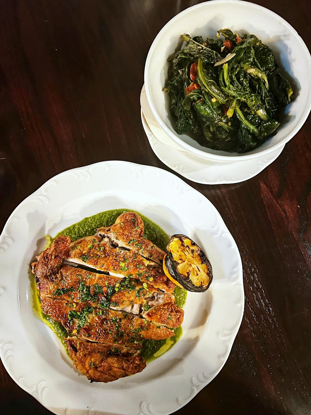The game hen and Chinese broccoli from Snack Bar serve as a North Loop late dinner.