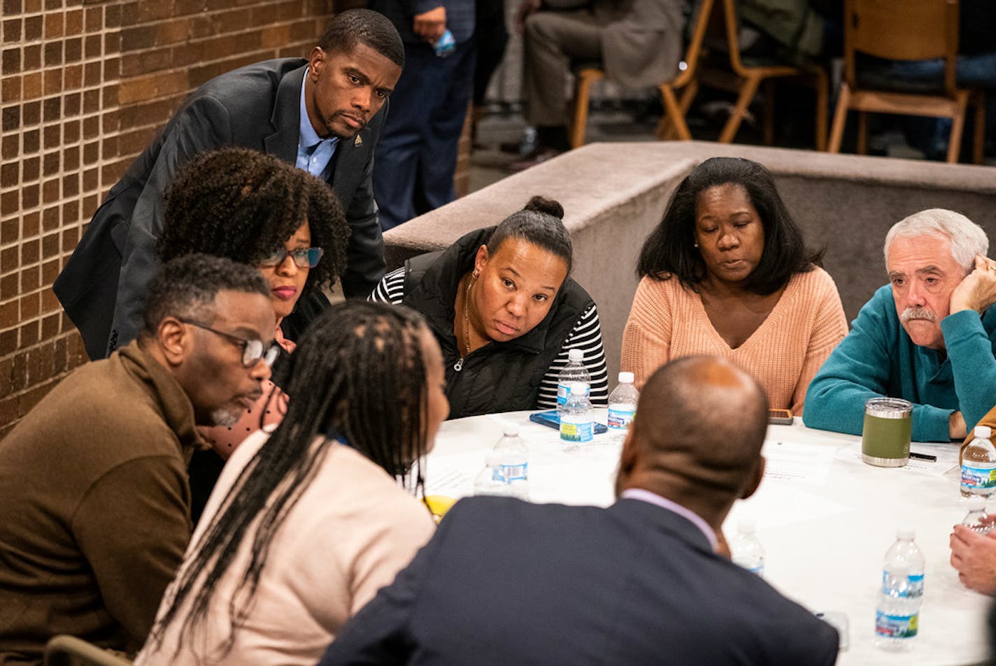 St. Paul Mayor Melvin Carter, top, listened in on small groups of community listening circles earlier this month.