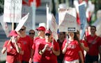 Thousands of nurses walked around Abbott Northwestern on the first day of the strike, June 19, 2016, in Minneapolis.