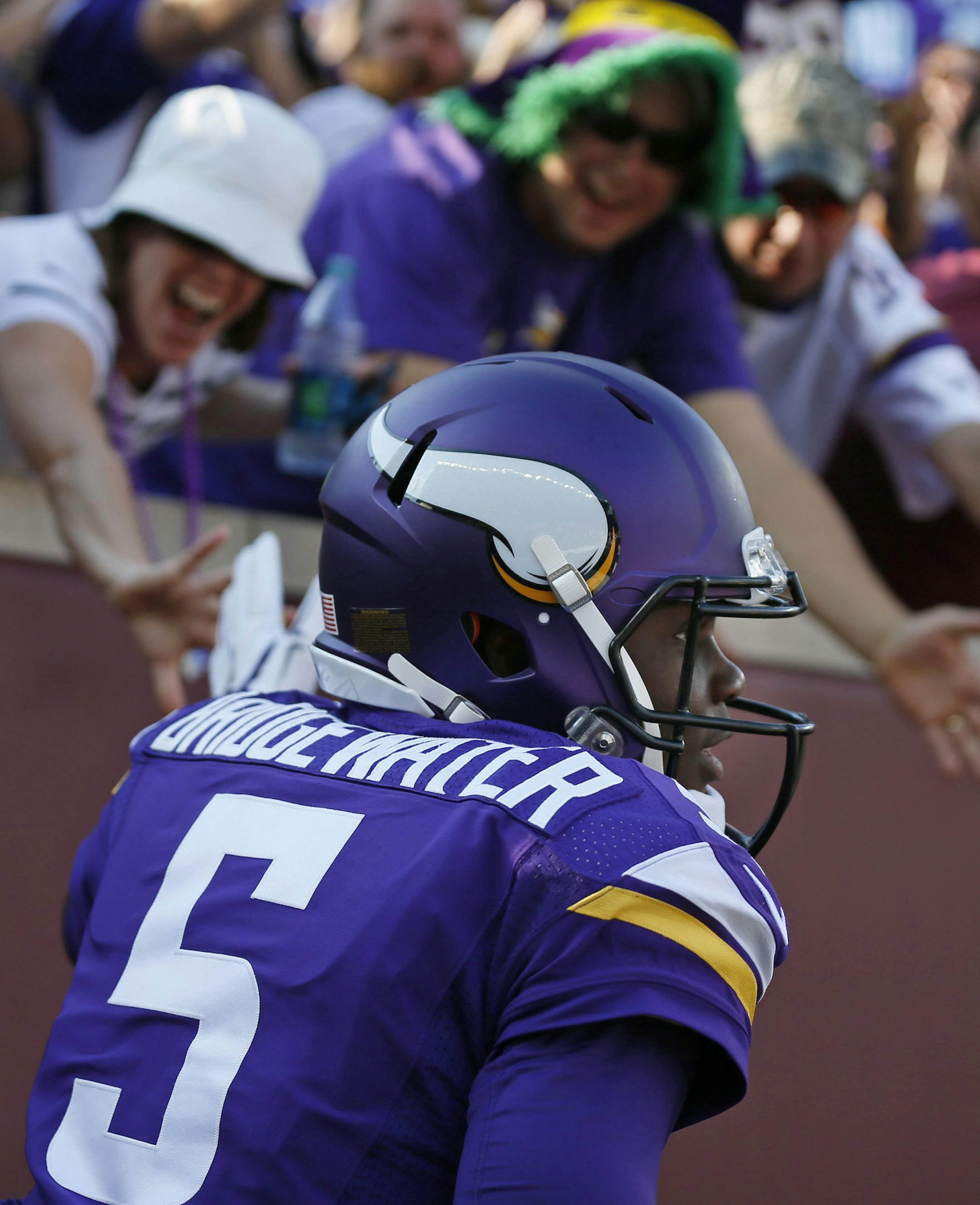 Minnesota Vikings quarterback Teddy Bridgewater (5) celebrated his 13 yard touchdown in the second quarter. The Minnesota Vikings played the Atlanta Falcons at TCF Bank Stadium Sunday September 28 , 2014 in Minneapolis ,MN. ] Jerry Holt Jerry.holt@startribune.com