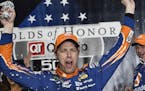Brad Keselowski celebrated in Victory Lane after winning a NASCAR Monster Cup series auto race at Atlanta Motor Speedway in Hampton, Ga., on Sunday.