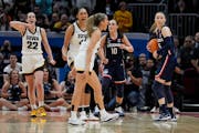 Iowa's Gabbie Marshall reacts after UConn's Aaliyah Edwards was called for an offensive foul during the final seconds of the second half Friday.