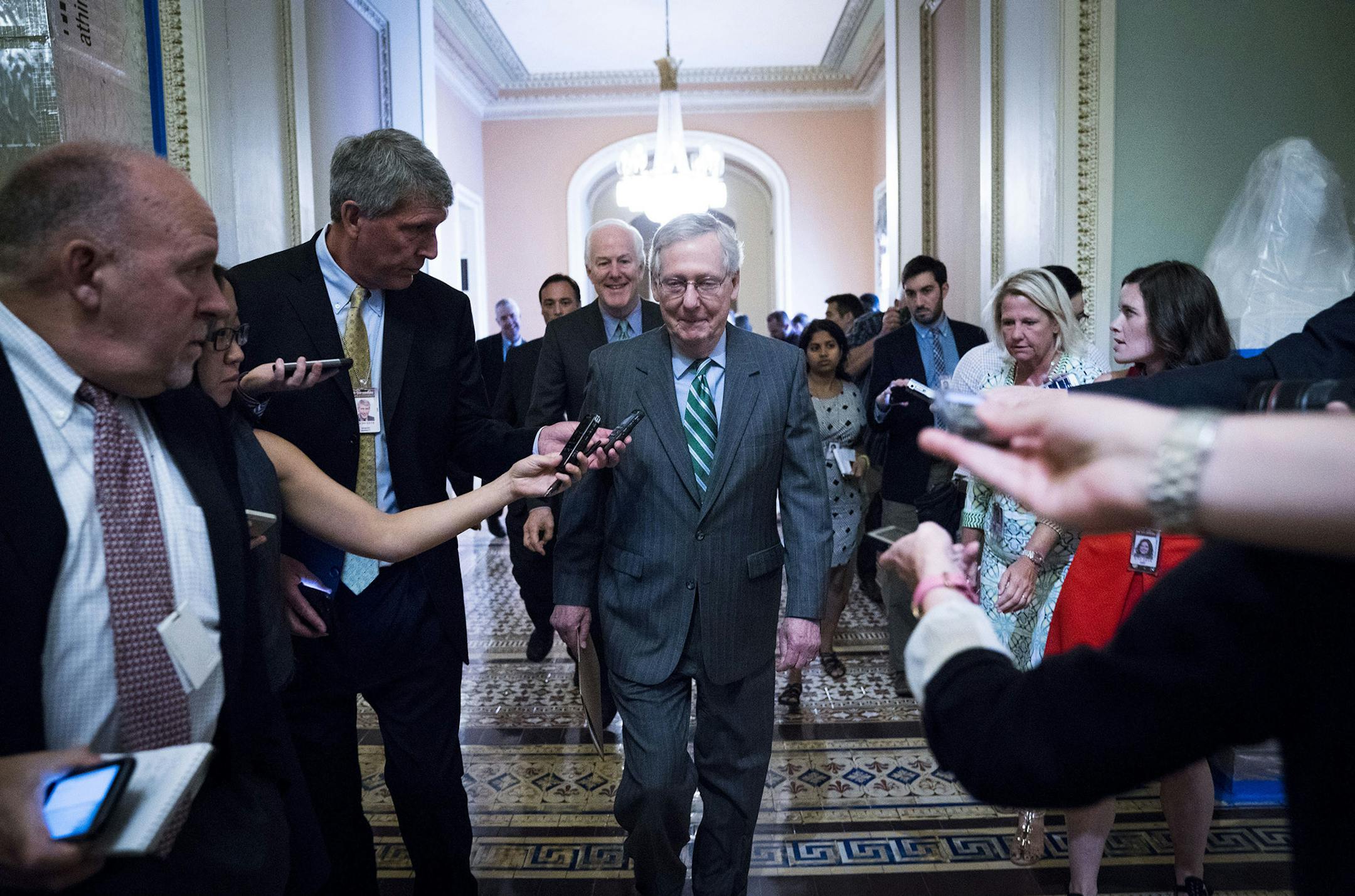 Senate Majority Leader Mitch McConnell (R-Ky.) departs a closed-door meeting on Capitol Hill, in Washington, June 22, 2017. Senate Republicans took a major step Thursday toward repealing and replacing the Affordable Care Act, unveiling a bill that would make deep cuts to Medicaid and end the mandate that most Americans have health insurance. (Doug Mills/The New York Times) ORG XMIT: MIN2017062611385729