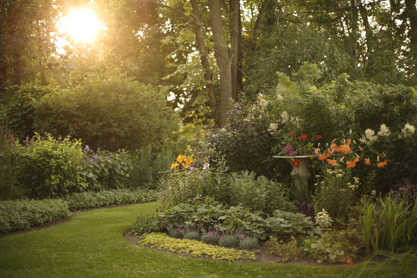 A lower bed in Wouterina de Raad's garden last summer. ] JEFF WHEELER &#xef; jeff.wheeler@startribune.com Artist Wouterina de Raad's garden is a showcase for her concrete mosaic sculptures on her farm in Beldenville, WI. Her gardens were photographed Tuesday, July 29, 2014.