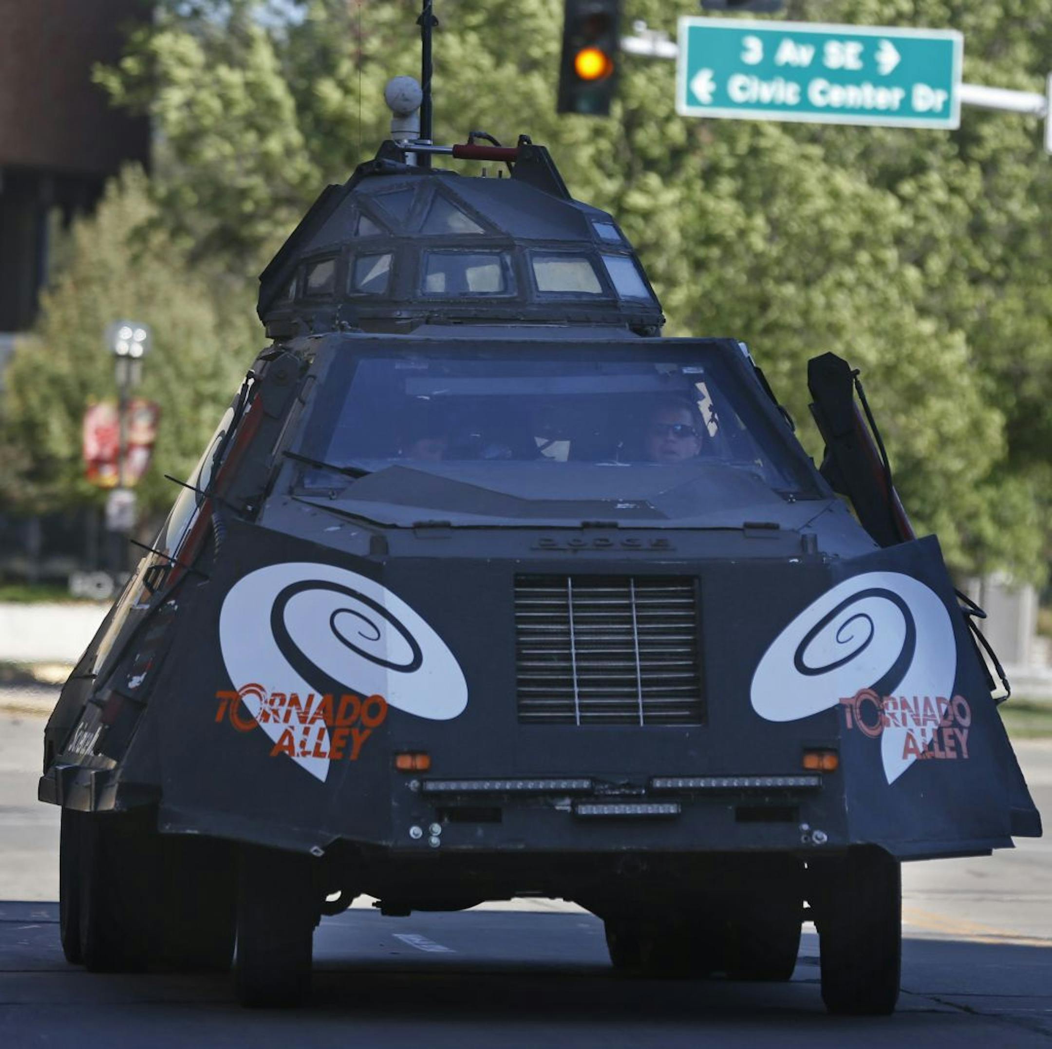 Meteorologist Brandon Ivey drove the TIV to the library, where a stream of visitors peeked through the open windows. "It's very cool," 10-year-old Caleb Timmerman said.