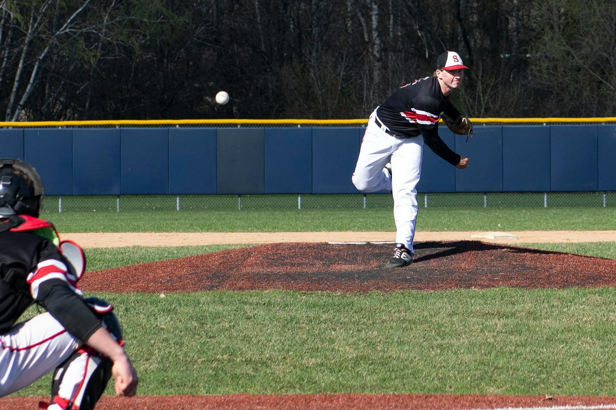 Stillwater Area High School Senior Will Frisch (15) pitched the ball. ] COURTNEY DEUTZ • courtney.deutz@startribune.com on Friday, April 26, 2019 at Woodbury High School. Stillwater won against Woodbury.