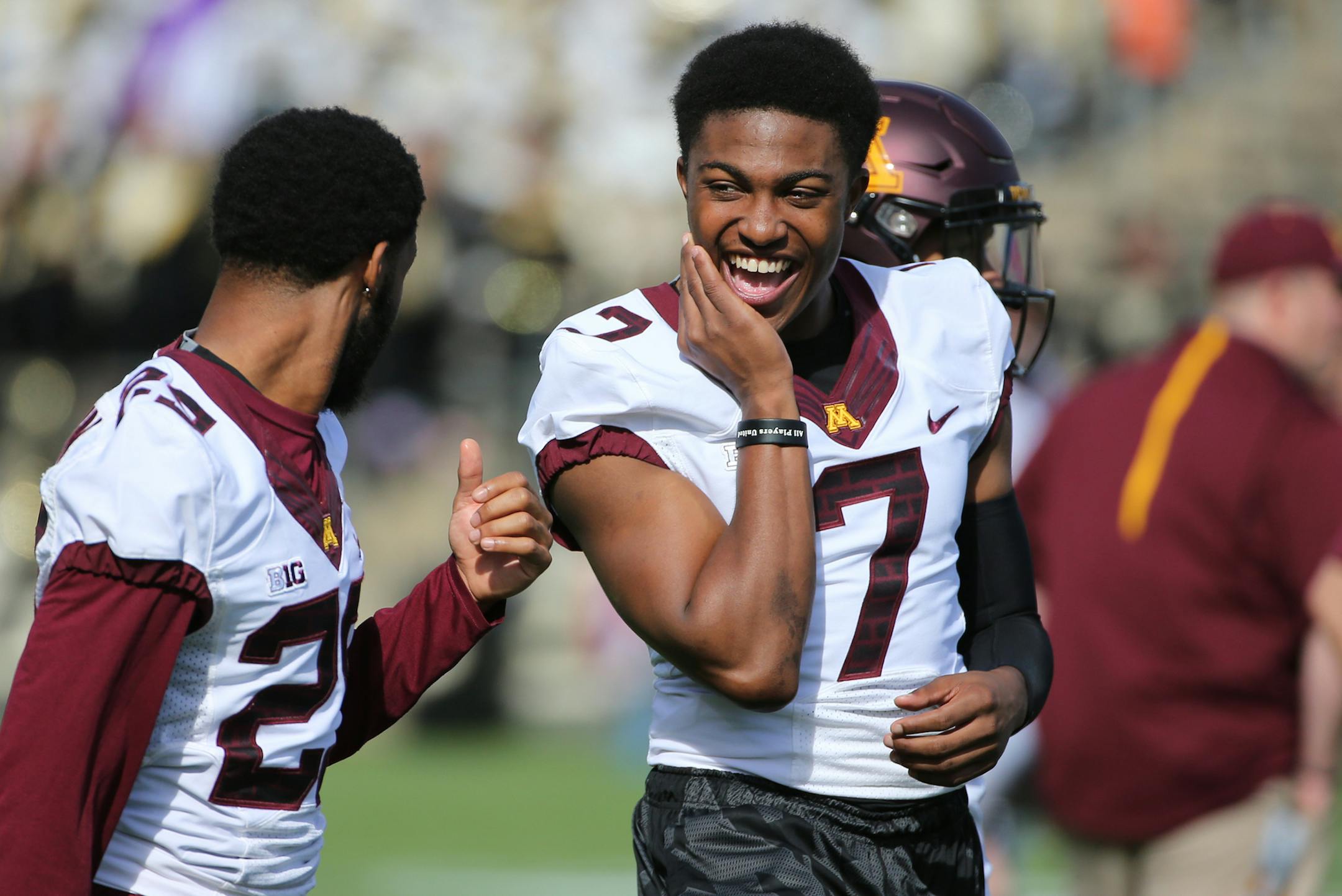 Injured players Minnesota Golden Gophers defensive back Briean Boddy-Calhoun (29), left and Minnesota Golden Gophers defensive back Damarius Travis (7) joked around before their team's game against Purdue. ] (LEILA NAVIDI/STAR TRIBUNE) leila.navidi@startribune.com Gophers vs Purdue at Ross-Ade Stadium in West Lafayette., Saturday October 10, 2015. ORG XMIT: MIN1510101558170497