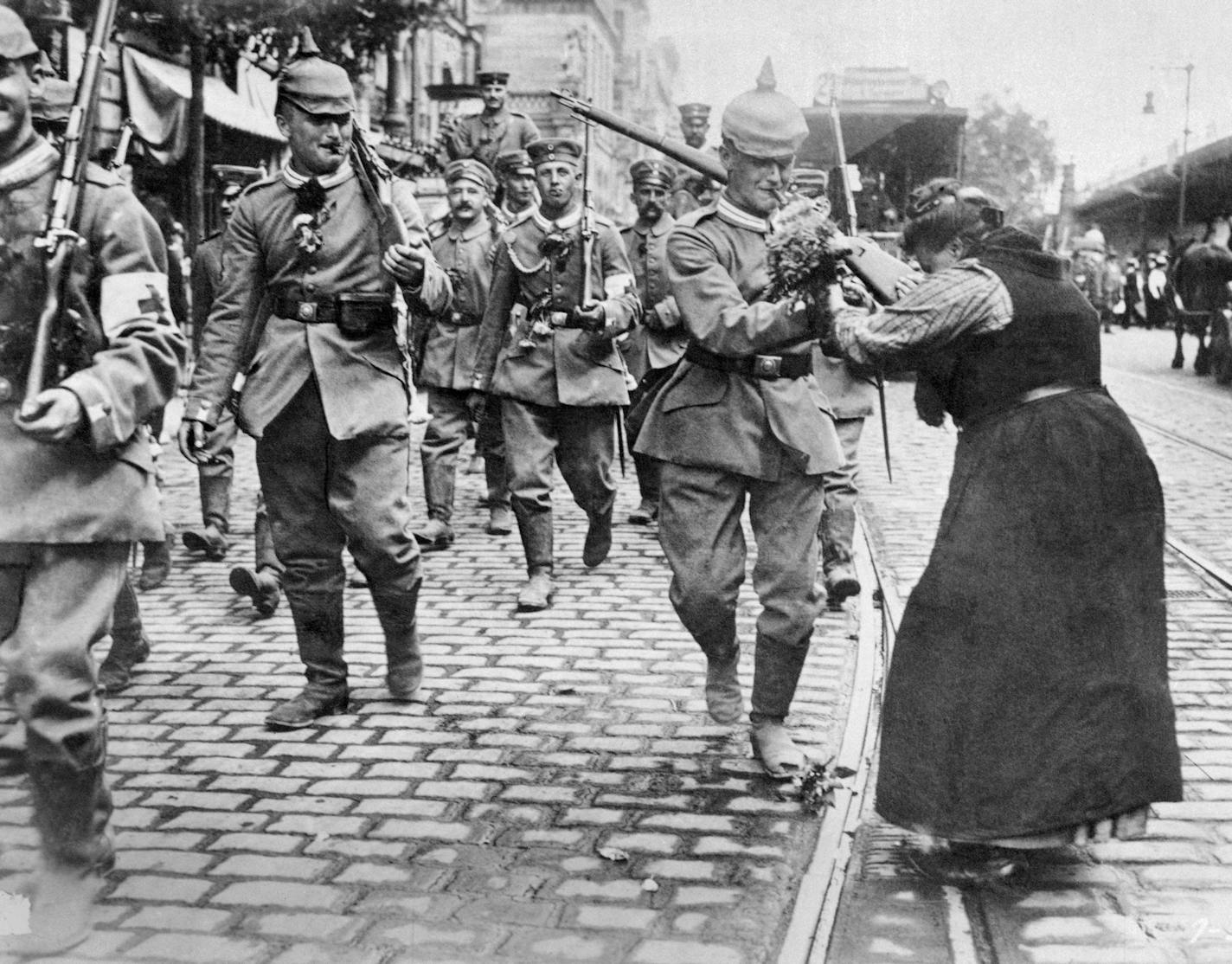 Prussian soldiers leaving Berlin for the front are given flowers by girls and women during World War I in an undated photo. (AP Photo) ORG XMIT: APHS115027