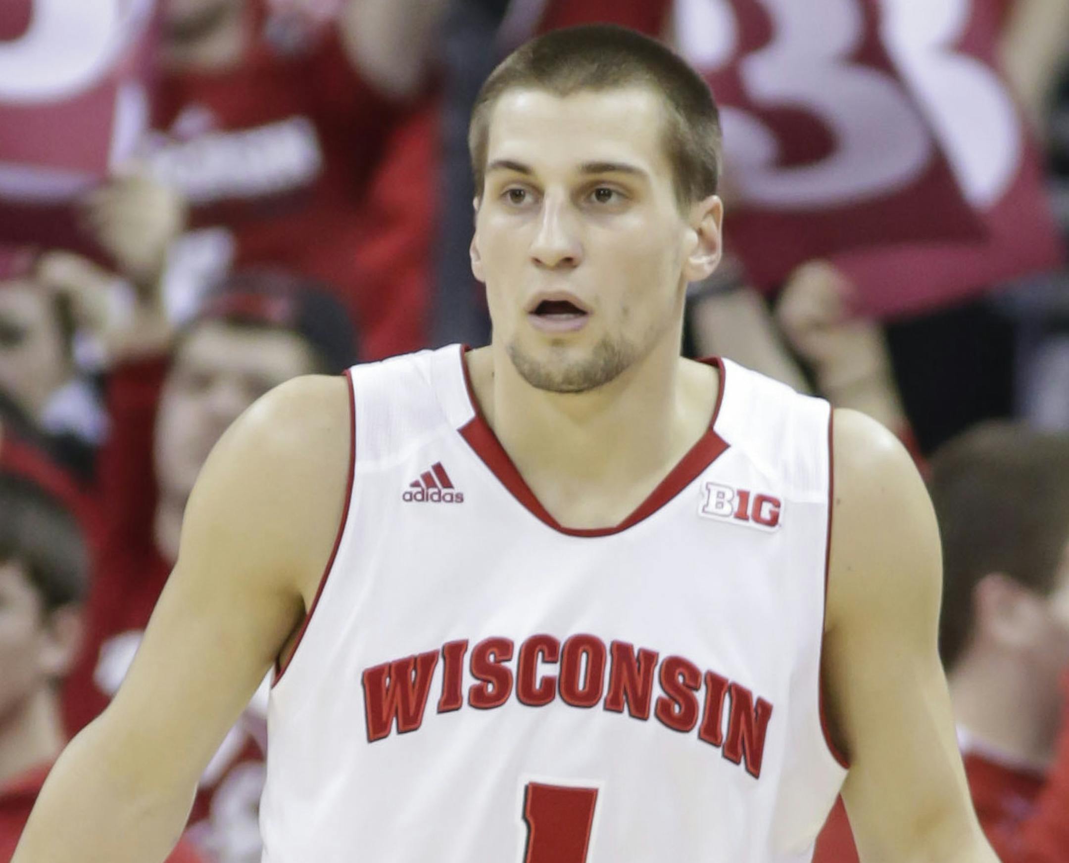 Fans celebrate after Wisconsin's Ben Brust made a 3-point basket against Indiana during the second half of an NCAA college basketball game Tuesday, Feb. 25, 2014, in Madison, Wis. Wisconsin won 69-58. (AP Photo/Andy Manis) ORG XMIT: WIAM1